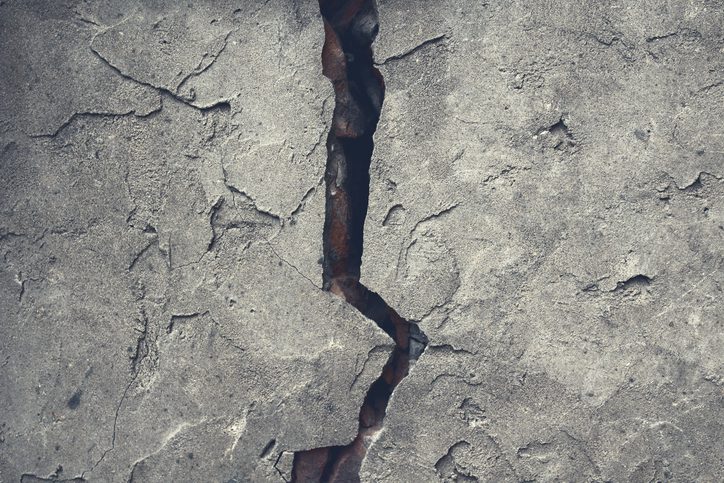 Structural crack across a concrete surface